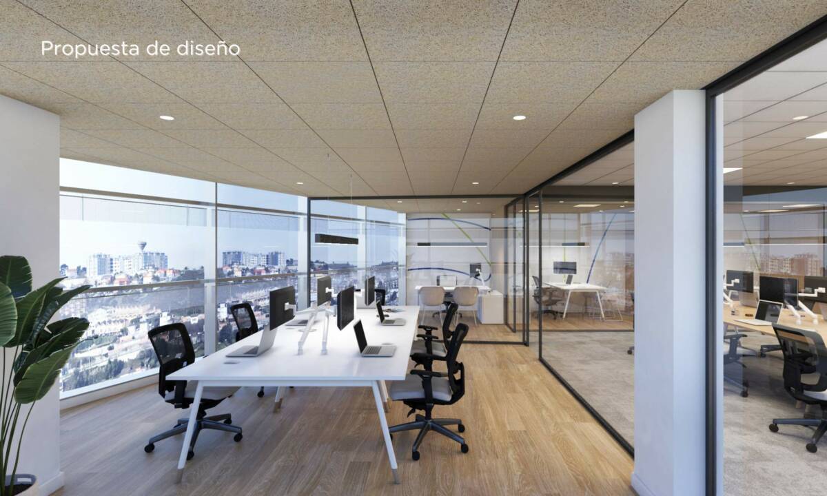 Render de oficina en Galicia_ Espacio de trabajo con gran ventanal